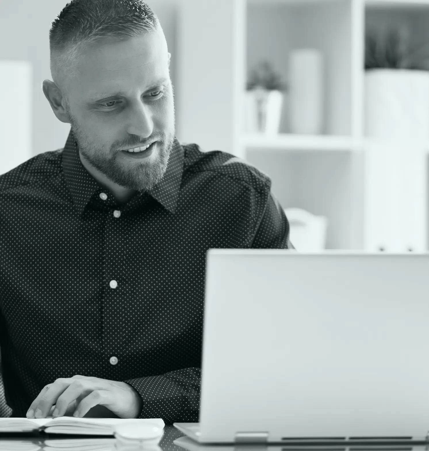 A male psychologist in an online therapy session