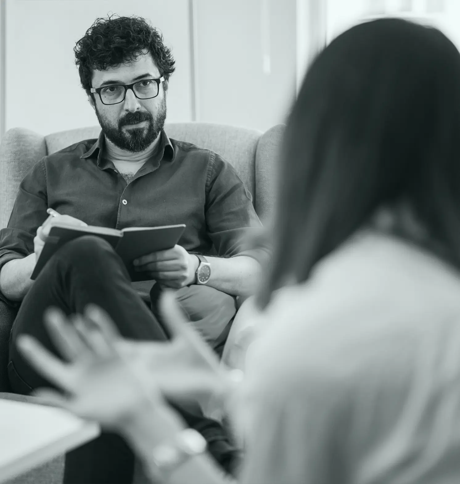 Mental health professional listening to patient
