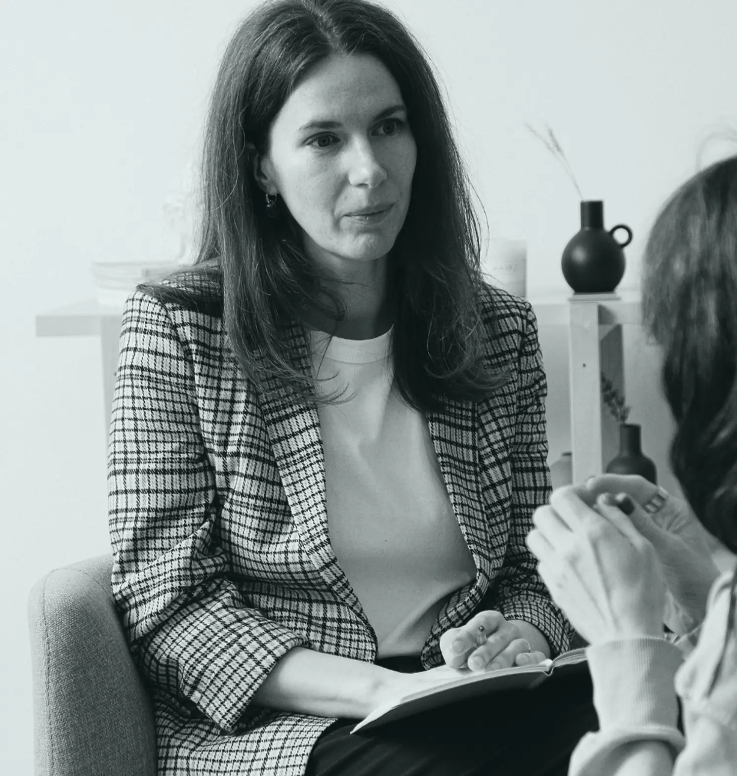 Therapist listening to patient